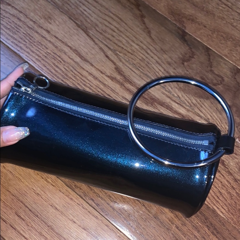 KARA iridescent duffel wristlet: Galaxy Navy